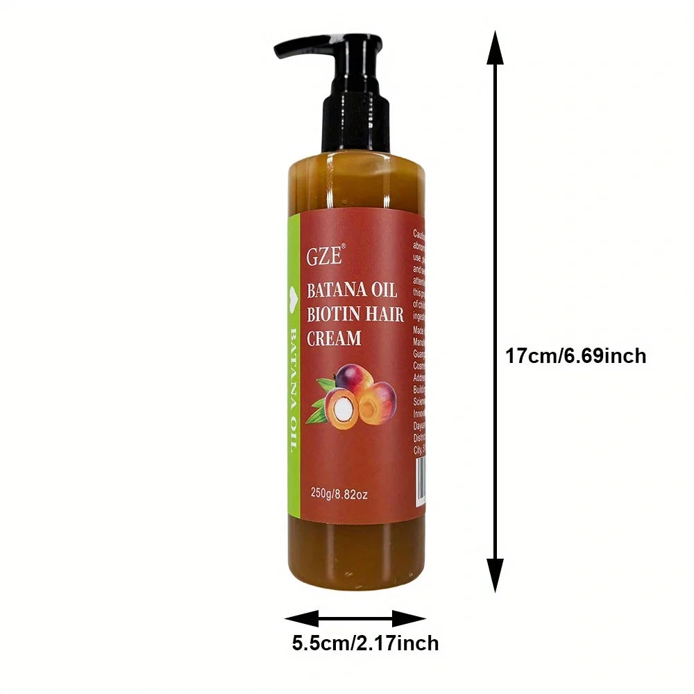 Crème capillaire à l'huile de batana et à la biotine GZE : fortifie les cheveux, répare les pointes fourchues et apporte de la douceur aux cheveux secs.