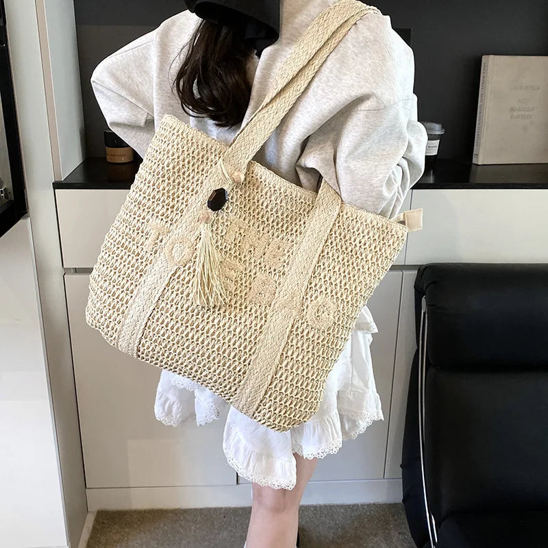 Sac en paille tressée style français grande capacité pour femme, sac bandoulière idéal pour la plage, les vacances ou les trajets quotidiens.